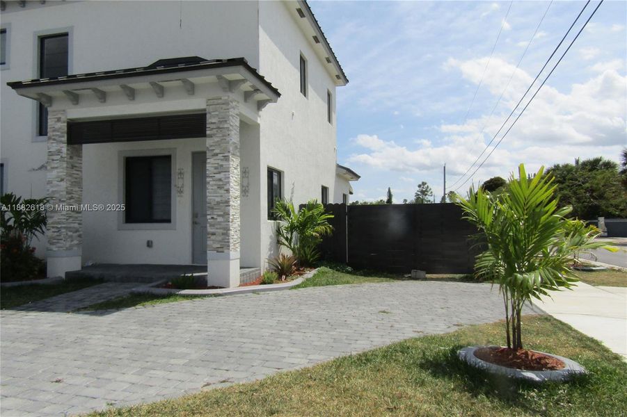 Front exterior of a new home in , Miami, FL, highlighting curb appeal (Image 16). Front exterior of a new home in , Miami, FL, highlighting curb appeal (Image 16).