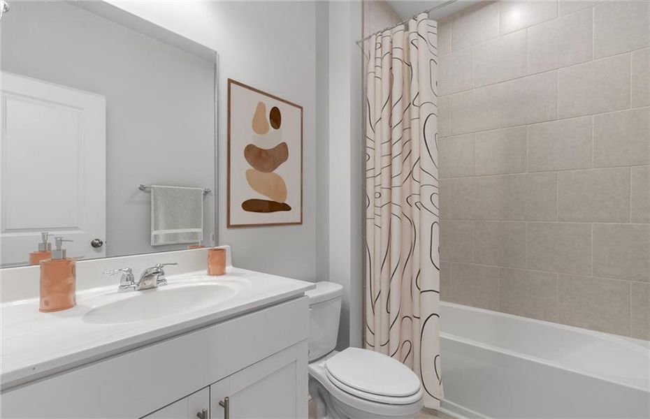 Furnished interior view inside a new home in Watermist at Mirror Lake, Villa Rica (Image 13).