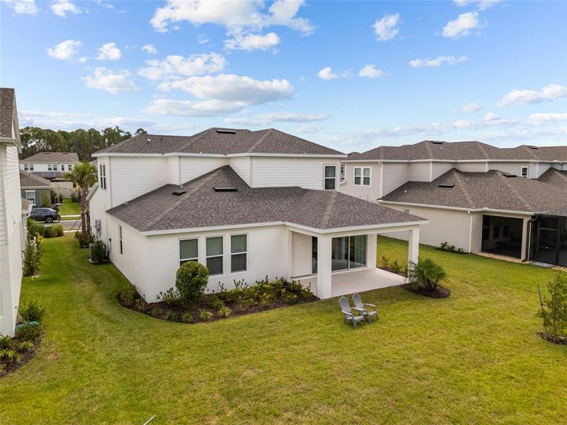 Exterior details and patio area of a home in River Landing, Wesley Chapel (Image 30).
