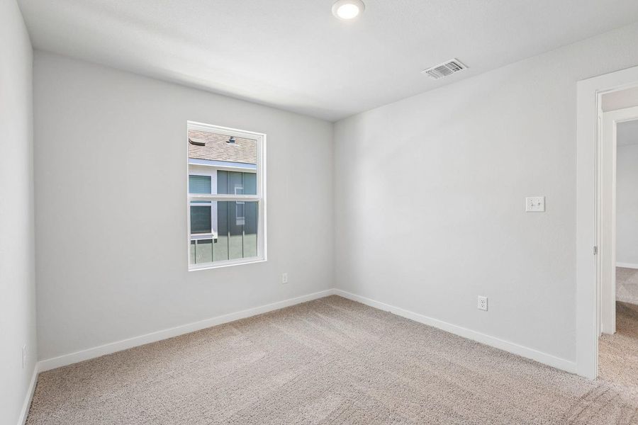 Spacious, unfurnished interior of a new home in Avery Centre, Round Rock (Image 11).