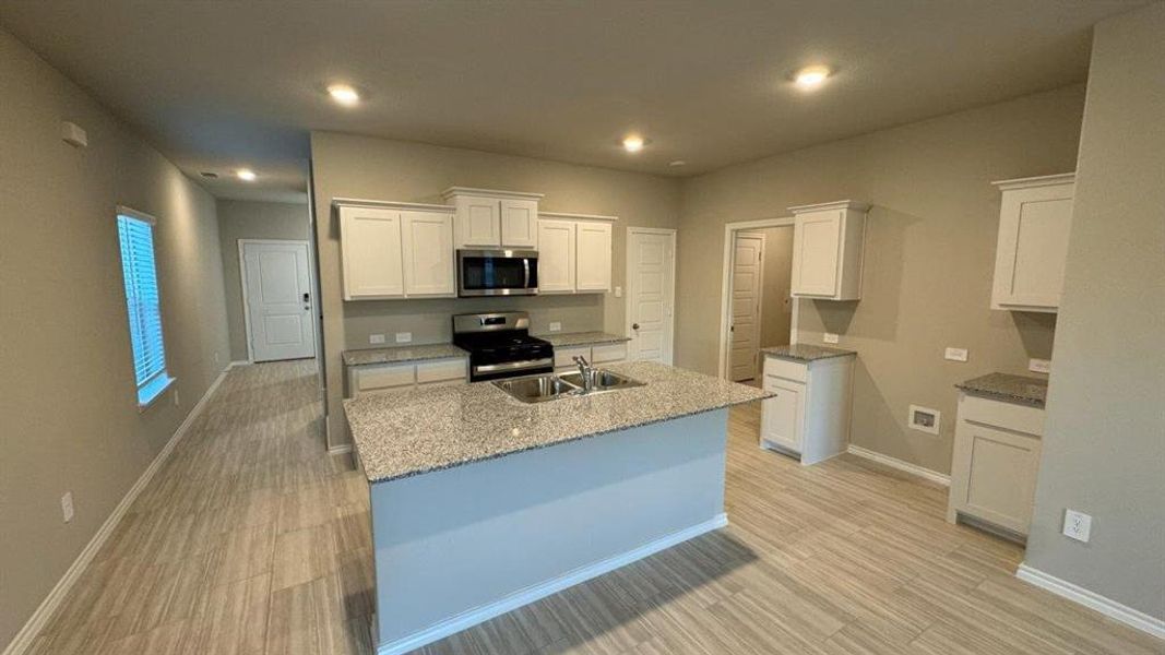 Kitchen- All Home and community information, including pricing, included features, terms, availability and amenities, are subject to change at any time without notice or obligation. All Drawings, pictures, photographs, video, square footages, floor plans, elevations, features, colors and sizes are approximate for illustration purposes only and will vary from the homes as built.