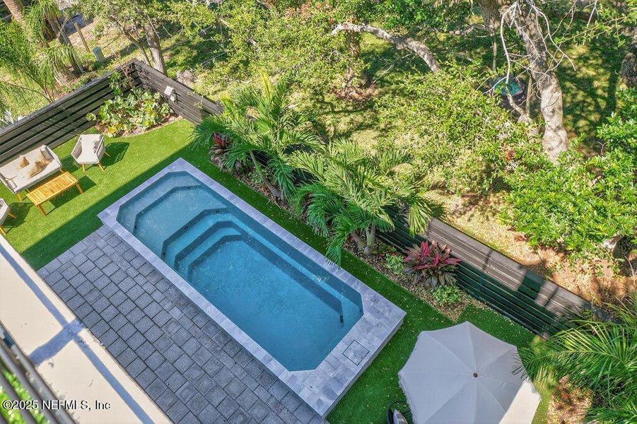 Exterior details and patio area of a home in , Neptune Beach (Image 34).