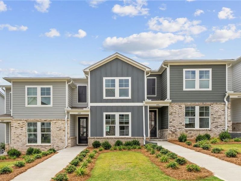 Front exterior of a new home in Stegall Village, Cartersville, GA, highlighting curb appeal (Image 1). Front exterior of a new home in Stegall Village, Cartersville, GA, highlighting curb appeal (Image 1).