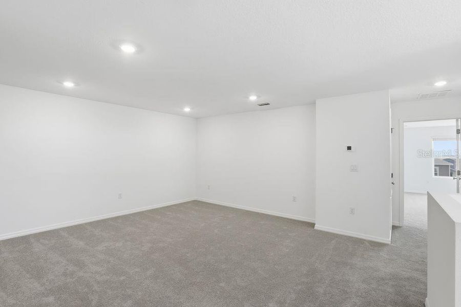 Spacious, unfurnished interior of a new home in Waterstone, Groveland (Image 34).