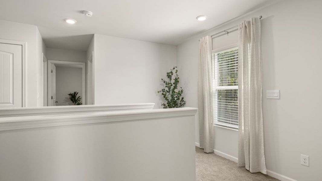 Representative furnished interior of a home built from the AISLE by D.R. Horton in Pointe Park, Union City (Image 30).