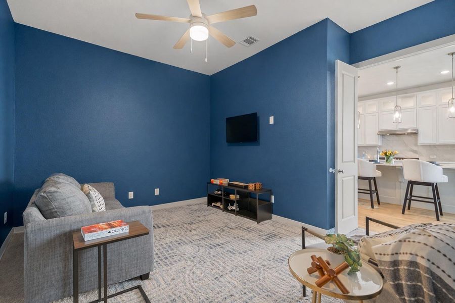 The location of this media room is divine! Imagine spending family movie nights in a centrally located place, versus never using your media room because it's a flight of stairs away!