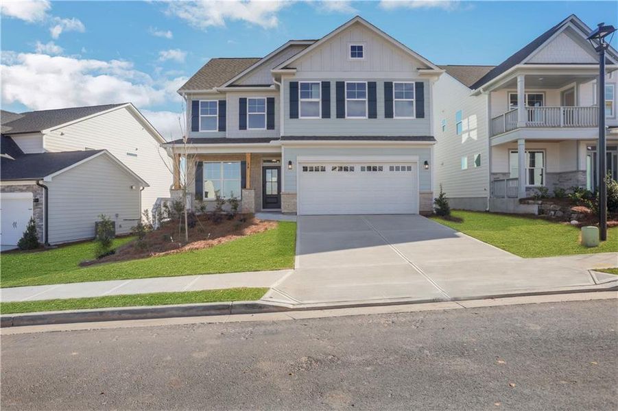 Front exterior of a new home in Twin Lakes, Hoschton, GA, highlighting curb appeal (Image 2).