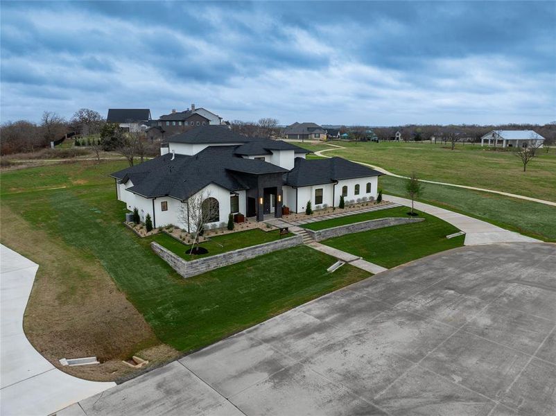 Front exterior of a new home in , Flower Mound, TX, highlighting curb appeal (Image 25).