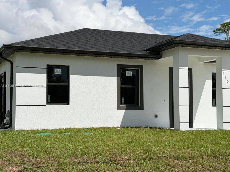 Exterior details and patio area of a home in , Lehigh Acres (Image 2).