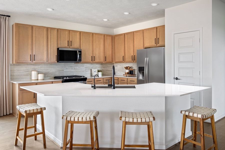 Representative furnished interior of a home built from the 2003 Modeled by KB Home in Sweetgrass Village, Crosby (Image 5).