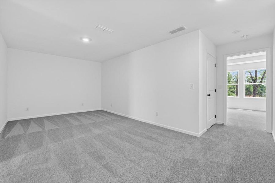Spacious, unfurnished interior of a new home in Weatherfield, Buford (Image 24).