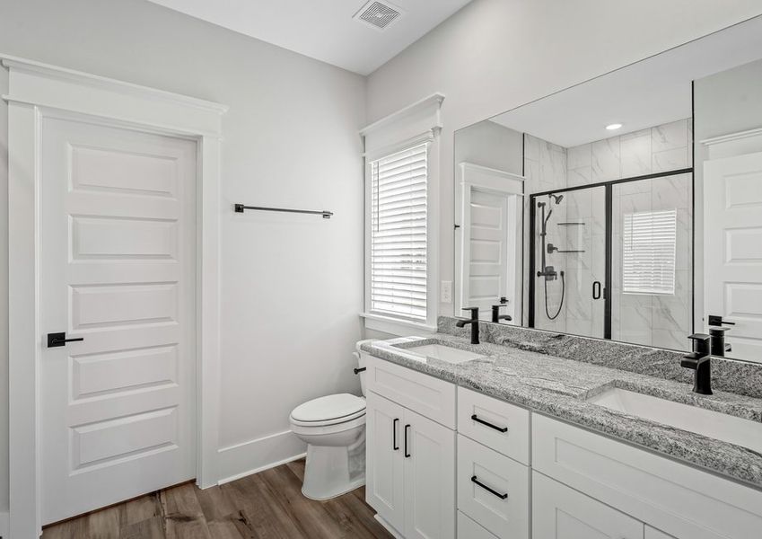 Master bath with a walk-in shower.