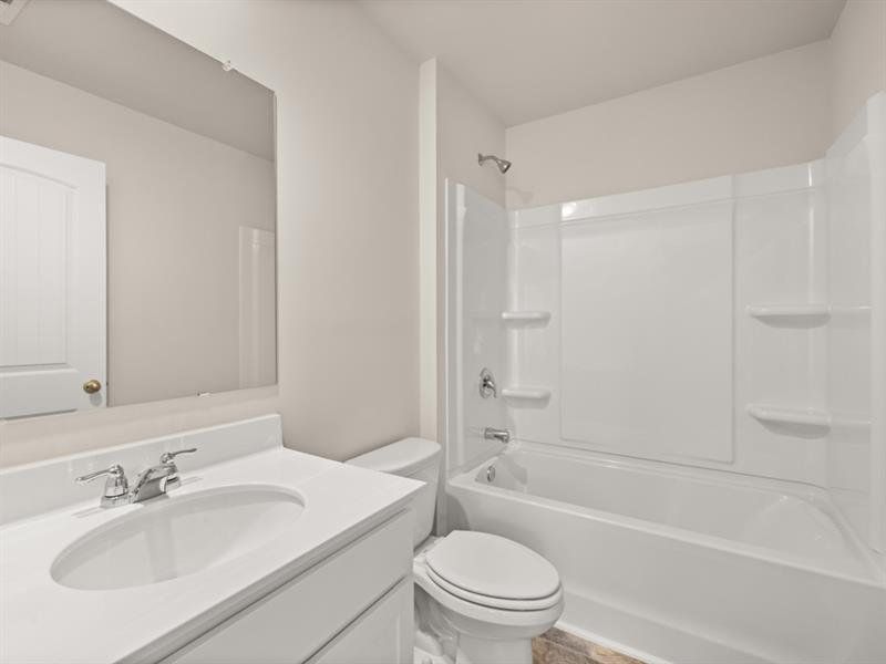 Furnished interior view inside a new home in Northwoods at Mirror Lake, Villa Rica (Image 14).