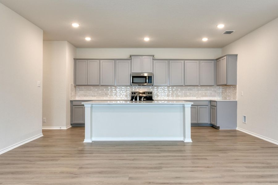 Representative furnished interior of a home built from the McKinney by Ashton Woods in Meadows at Hennersby Hollow 40's, San Antonio (Image 4).