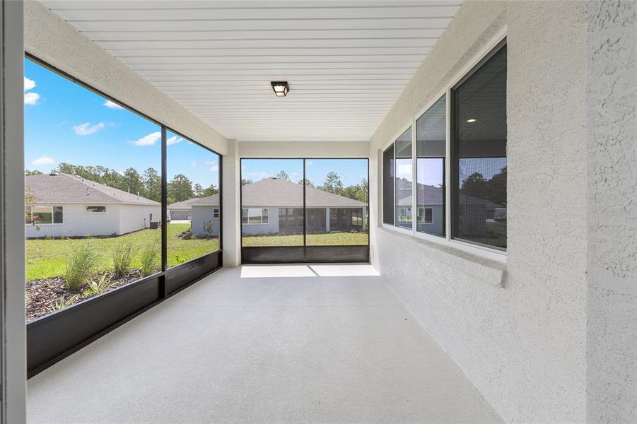 Exterior details and patio area of a home in On Top of the World Communities, Ocala (Image 24).
