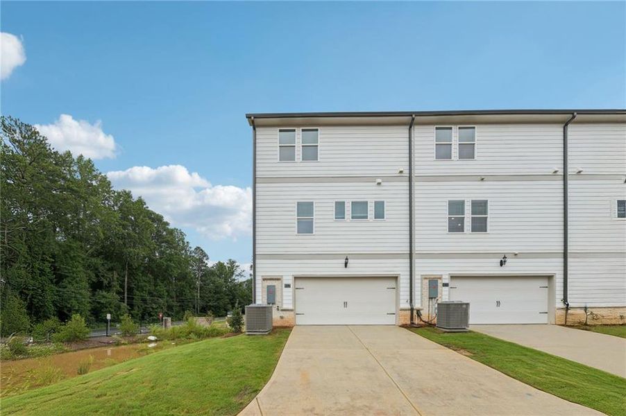 Exterior details and patio area of a home in Martin Springs - Highland Series, Lawrenceville (Image 3).