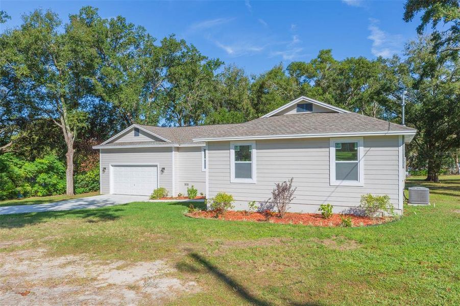 Front exterior of a new home in , Dade City, FL, highlighting curb appeal (Image 24).