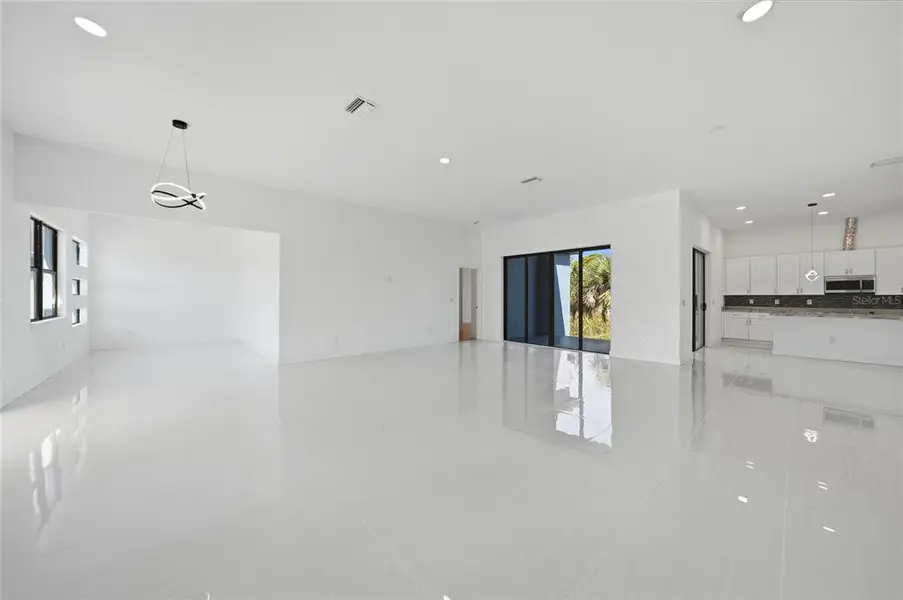 Spacious, unfurnished interior of a new home in , Port Charlotte (Image 21).