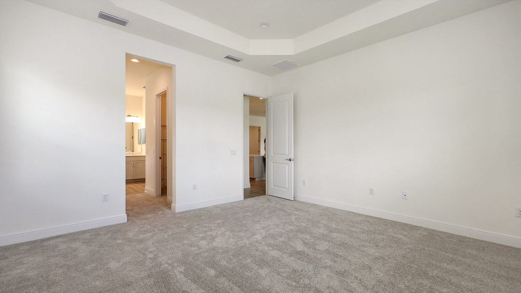 Spacious, unfurnished interior of a new home in Wildleaf at North River Ranch, Parrish (Image 36).