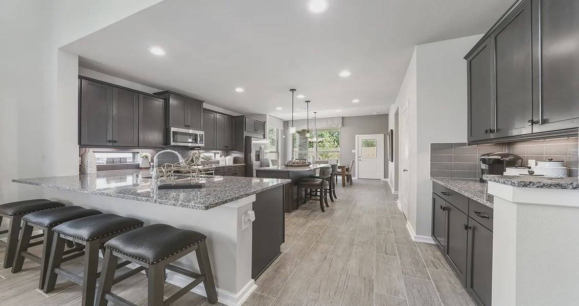 Representative furnished interior of a home built from the Durham by Chesmar Homes in Evergreen, Conroe (Image 9). Representative furnished interior of a home built from the Durham by Chesmar Homes in Evergreen, Conroe (Image 9).