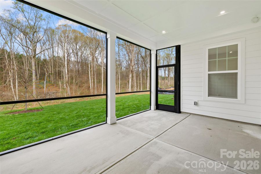 Exterior details and patio area of a home in Coventry Glen, Huntersville (Image 25).
