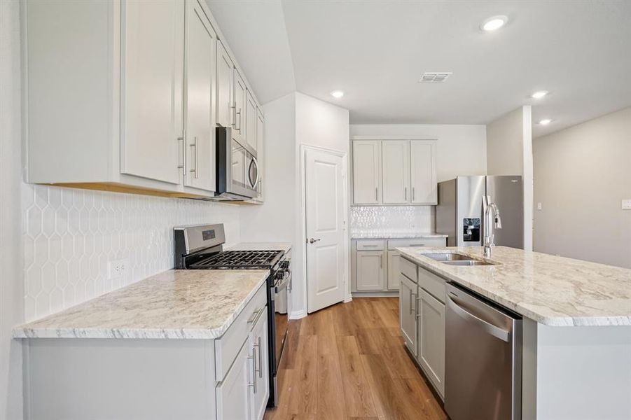 Photo is not of the actual home, but is an inspirational photo of builder’s model home and may depict options, furnishings, and/or decorator features that are not included.