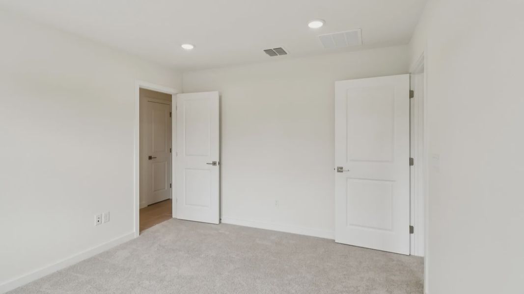 Furnished interior view inside a new home in Cyrene at Harmony, St. Cloud (Image 18).