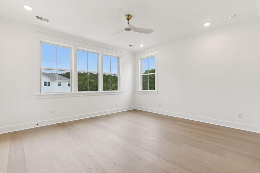 Spacious, unfurnished interior of a new home in Overlook at Copahee Sound, Awendaw (Image 27).