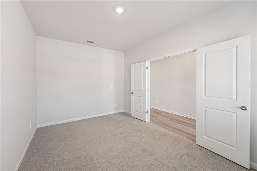 Spacious, unfurnished interior of a new home in Creekside at Oxford Park, Fairburn (Image 41).