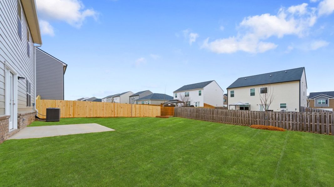 Exterior details and patio area of a home in The Reserve at Calcutta, Stockbridge (Image 2).