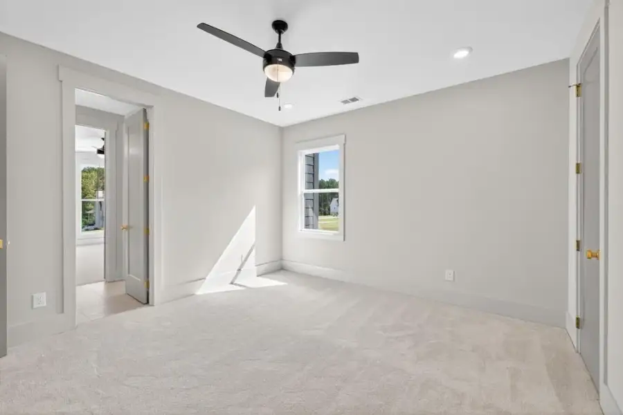 Spacious, unfurnished interior of a new home in The Manors, Jefferson (Image 32).