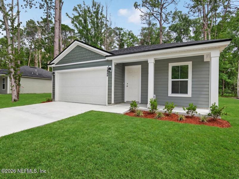 Front exterior of a new home in , Jacksonville, FL, highlighting curb appeal (Image 31).