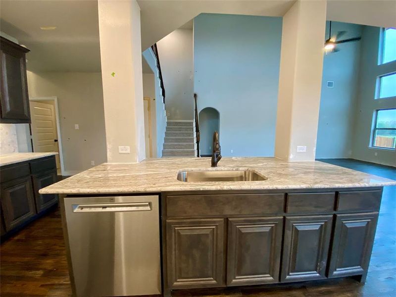Listed home has White Quartz w/grey veins