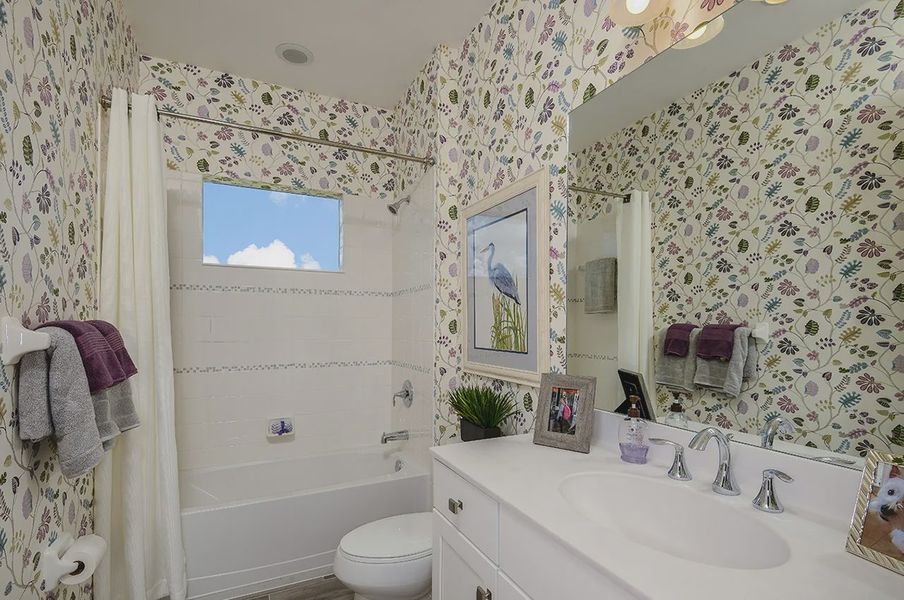 Representative furnished interior of a home built from the White Star by Neal Communities in SkySail, Naples (Image 8).