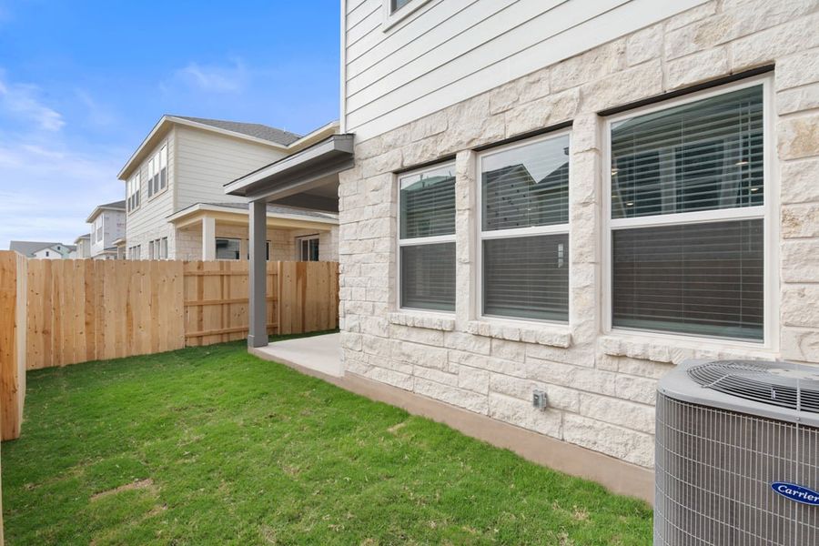 Exterior details and patio area of a home in Union Collection at Park Central, Georgetown (Image 32).