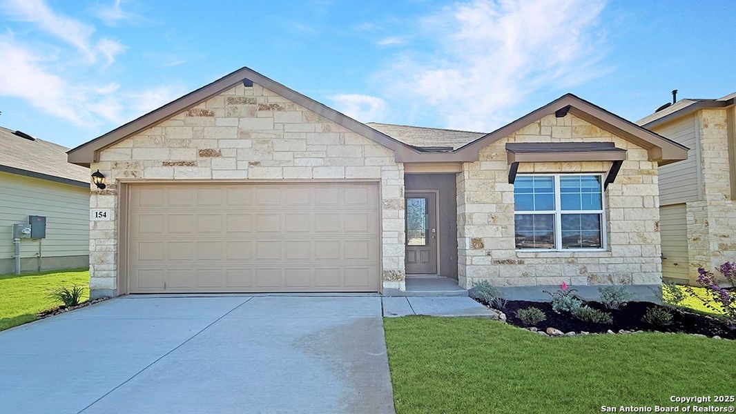Front exterior of a new home in Redbird Ranch, San Antonio, TX, highlighting curb appeal (Image 23). Front exterior of a new home in Redbird Ranch, San Antonio, TX, highlighting curb appeal (Image 23).