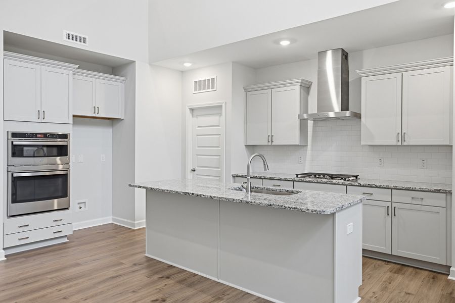 Furnished interior view inside a new home in Ovation at Sweetbrier, Durham (Image 9).