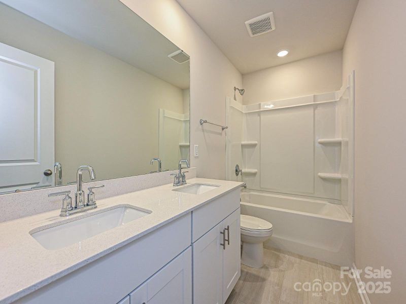 Photo is not of the actual home, but is an inspirational photo of builder’s model home and may depict options, furnishings, and/or decorator features that are not included