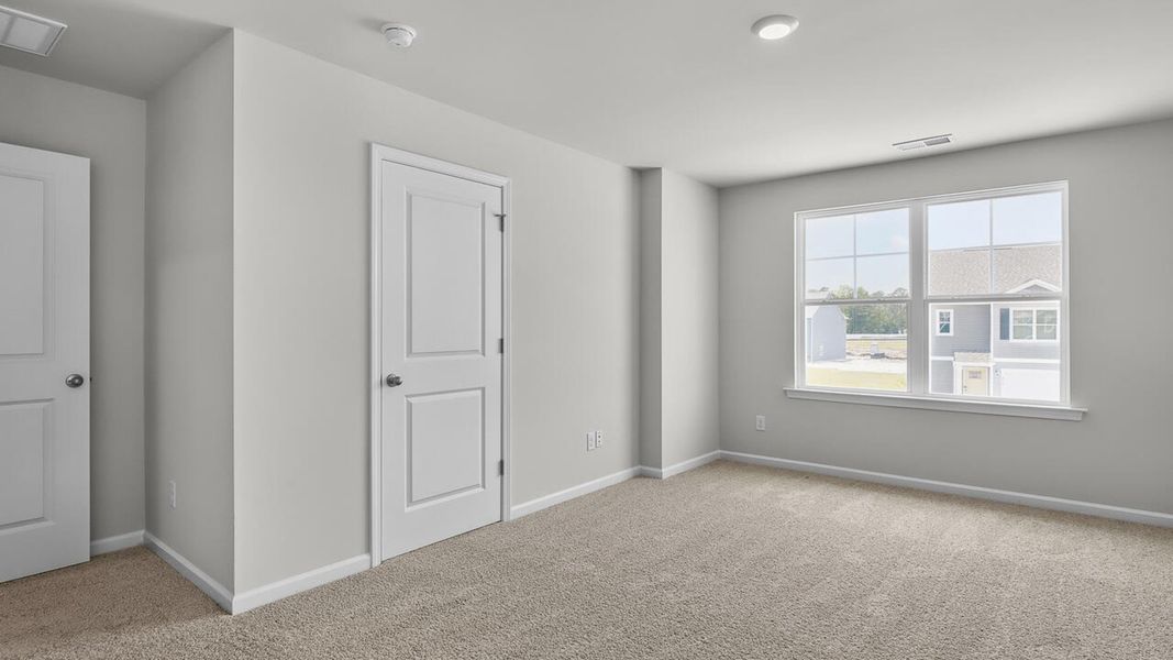 Spacious, unfurnished interior of a new home in Townes at Seabrooke, Leland (Image 21).