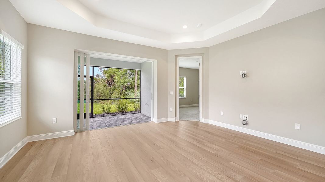 Spacious, unfurnished interior of a new home in Wildleaf Real Estate and Homes for Sale in Parrish, FL - Neal Communities, Parrish (Image 18).