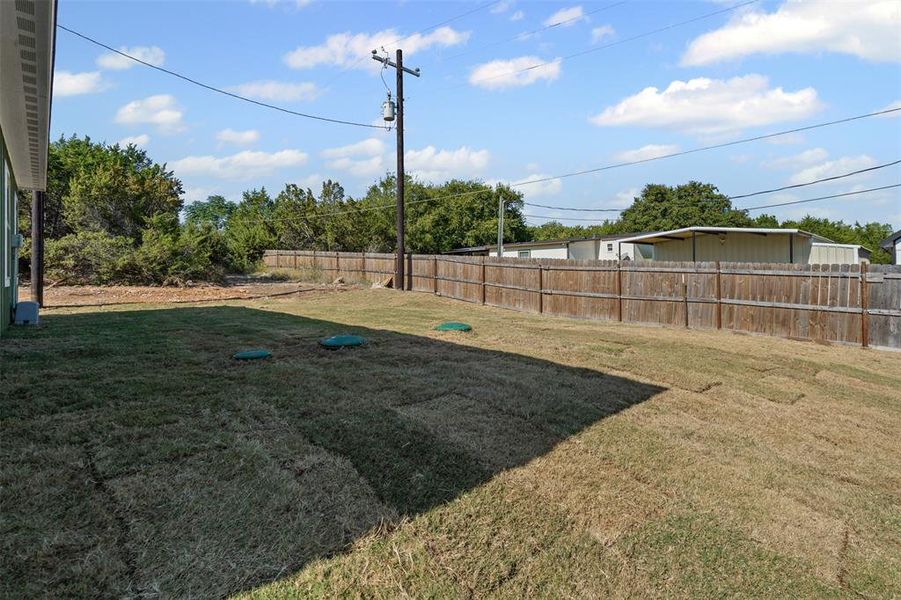 Exterior details and patio area of a home in , Granbury (Image 4).