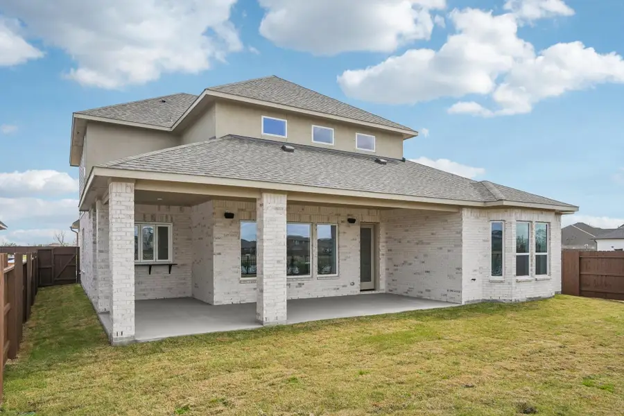 Exterior details and patio area of a home in Del Bello Lakes 60', Manvel (Image 27).