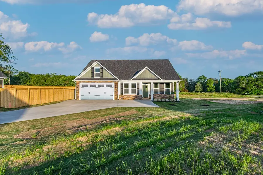 Representative exterior photo of a completed home built from the Mediterranean by Enchanted Homes in Messer Farms, Inman, SC (Image 2).