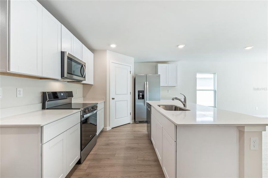 Furnished interior view inside a new home in Central Parc, North Port (Image 7).