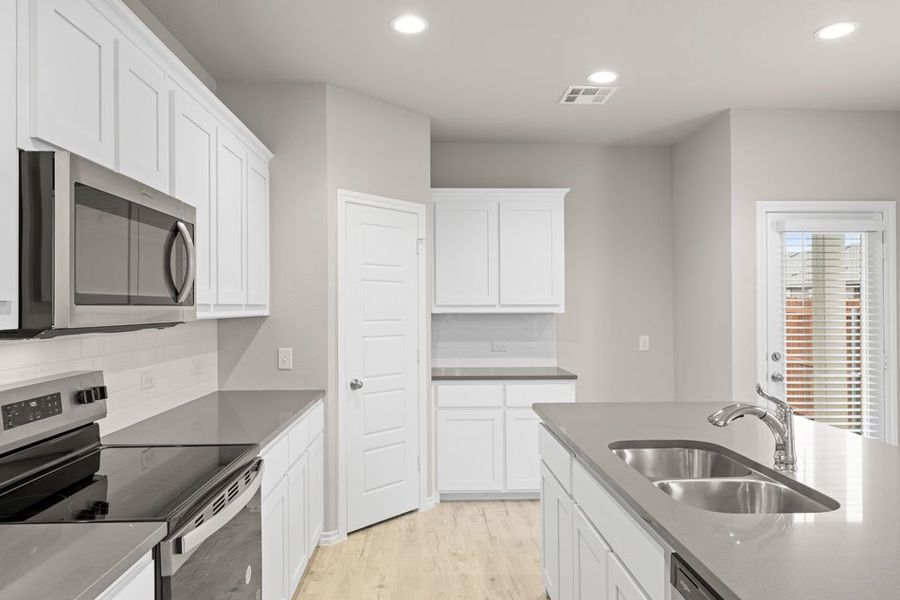 Representative exterior photo of a completed home built from the Willow by Impression Homes in Creekside Ranch, Blue Ridge, TX (Image 6).