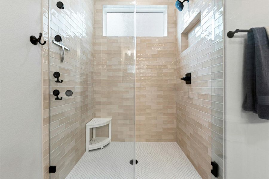 Full bath with a upgraded walk-in shower
