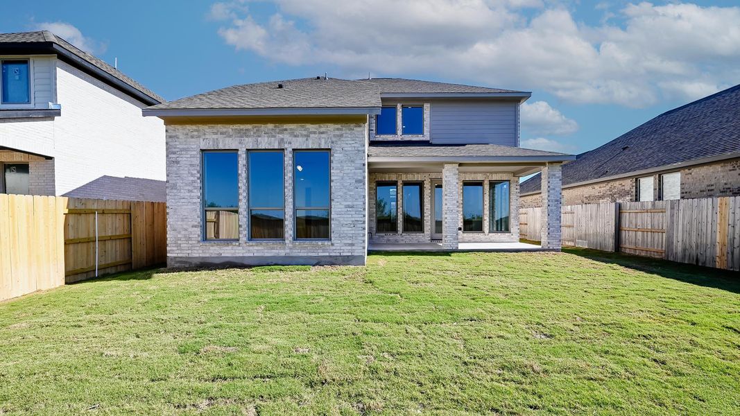 Exterior details and patio area of a home in Crosswinds 50', Kyle (Image 18). Exterior details and patio area of a home in Crosswinds 50', Kyle (Image 18).