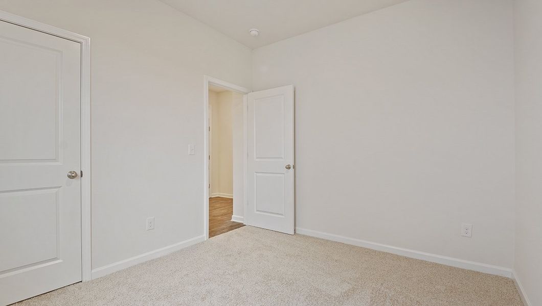 Representative unfurnished interior of a home built from the Macon by D.R. Horton in Stanton, Richburg (Image 24).