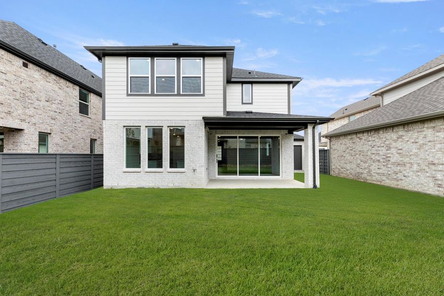 Exterior details and patio area of a home in Union Park, Little Elm (Image 4).