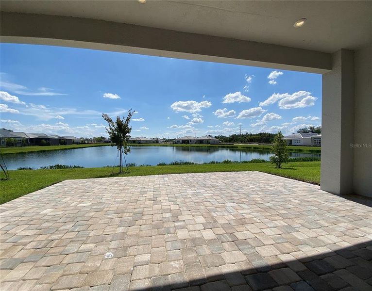 Exterior details and patio area of a home in Valencia Ridge (55+), Wesley Chapel (Image 4).